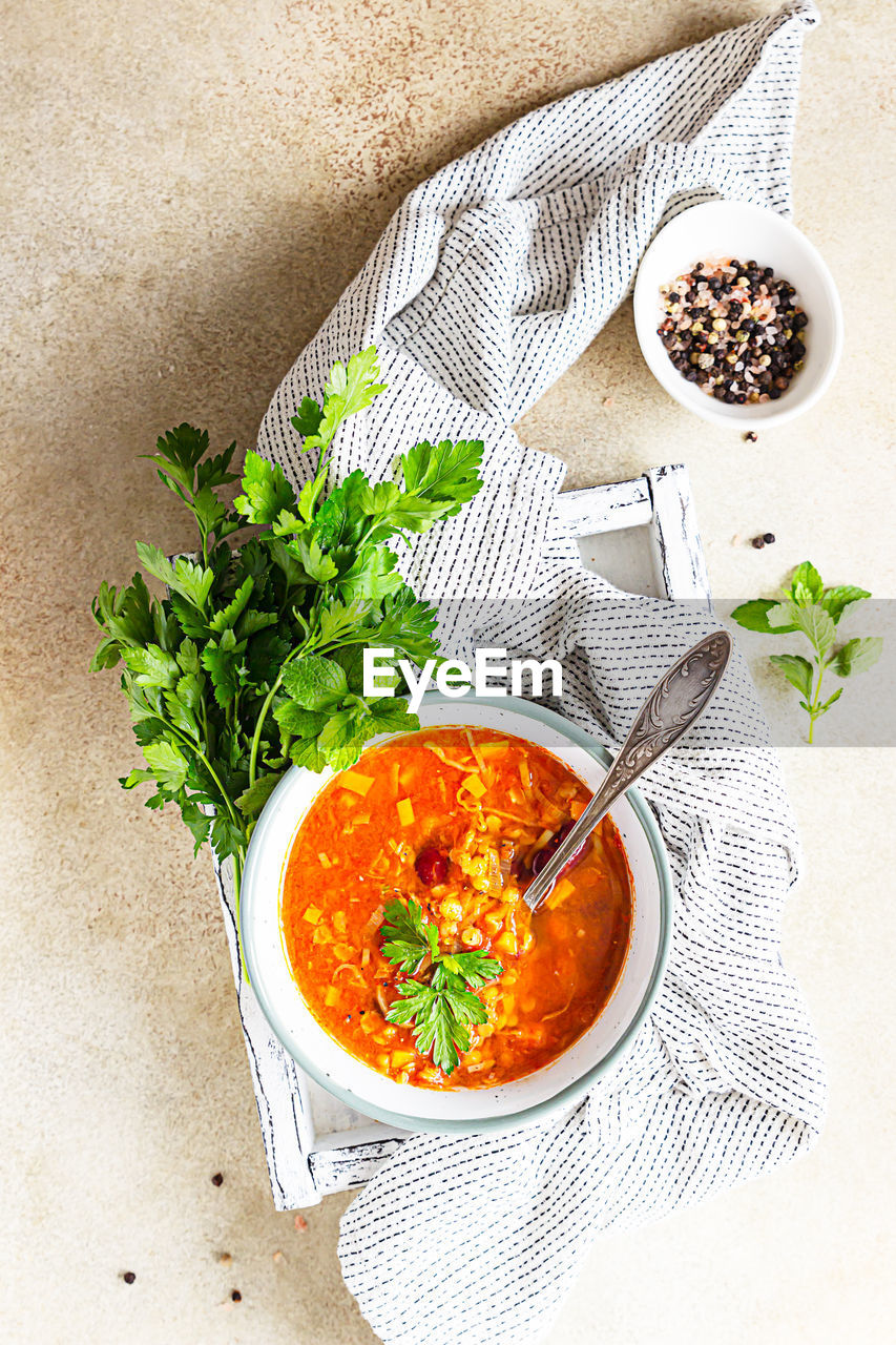 Hot and spicy, thick lentil and red bean soup with canned tomatoes and coriander. 