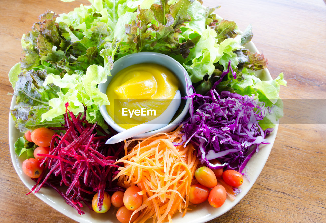 Close-up of fresh raw vegetables served in plate