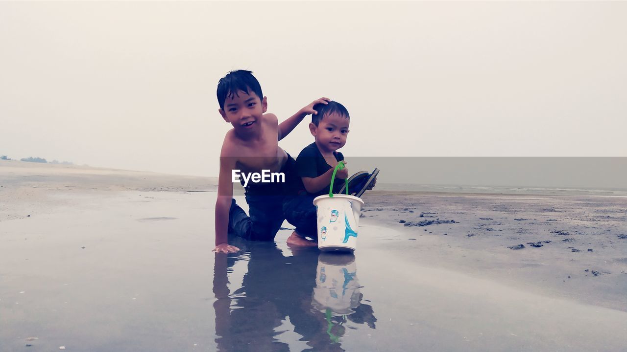 BOYS ON BEACH