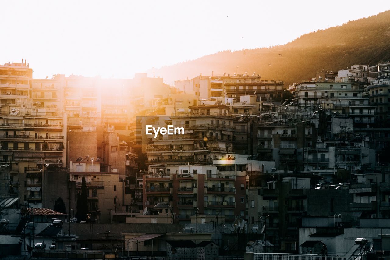 Crowded residential buildings at sunset