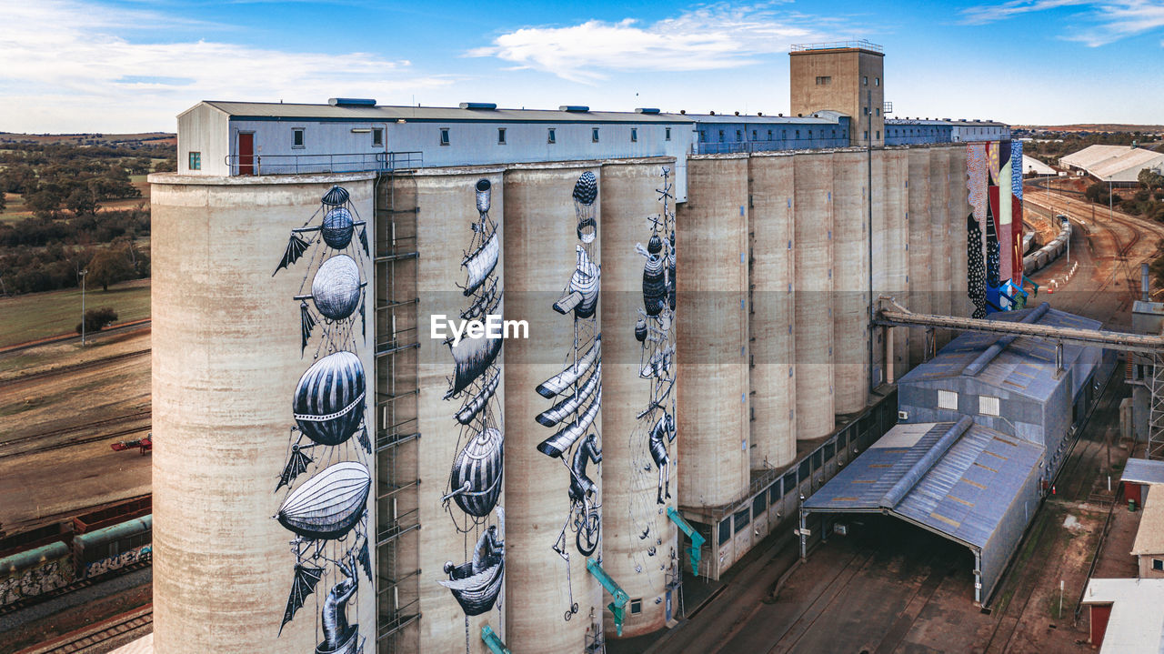 CLOTHES DRYING ON WOODEN BUILDING