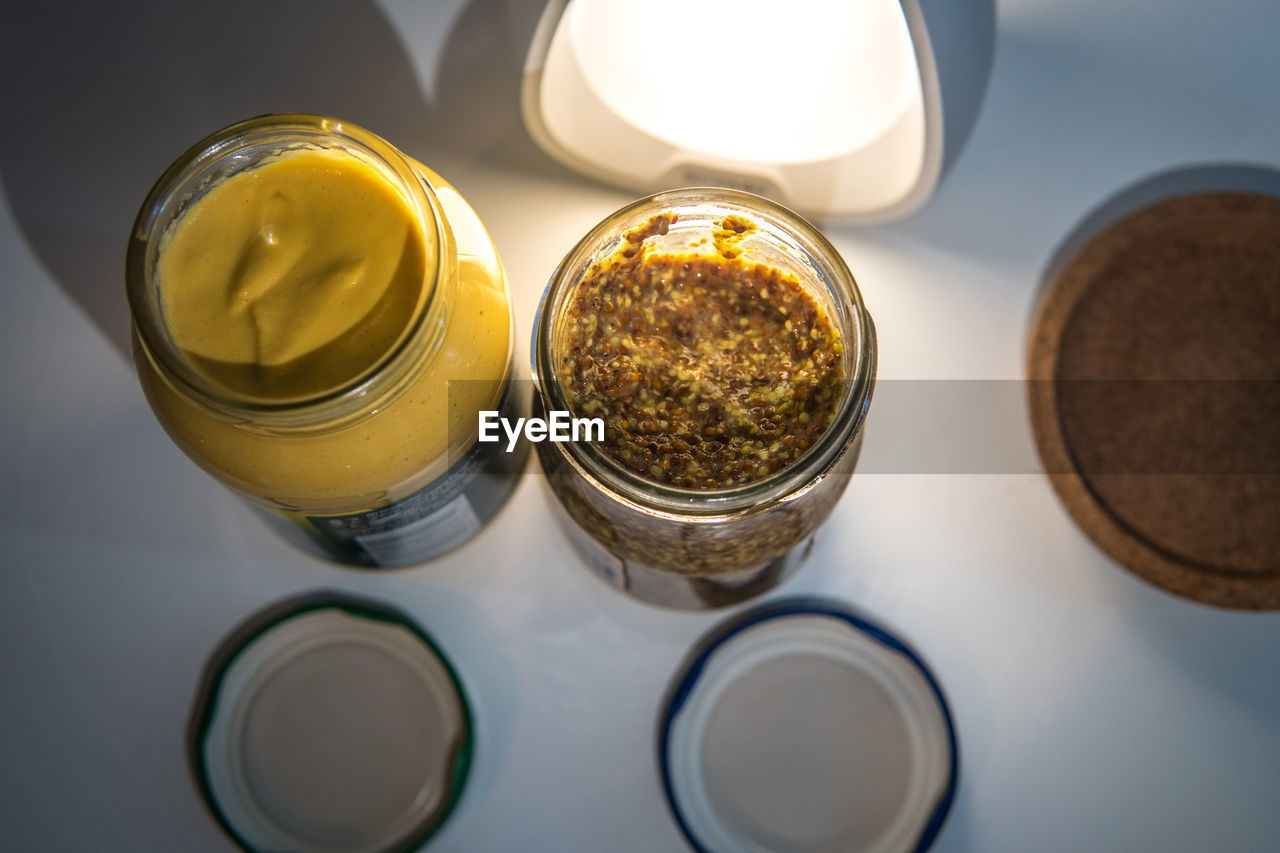 HIGH ANGLE VIEW OF BEER ON TABLE