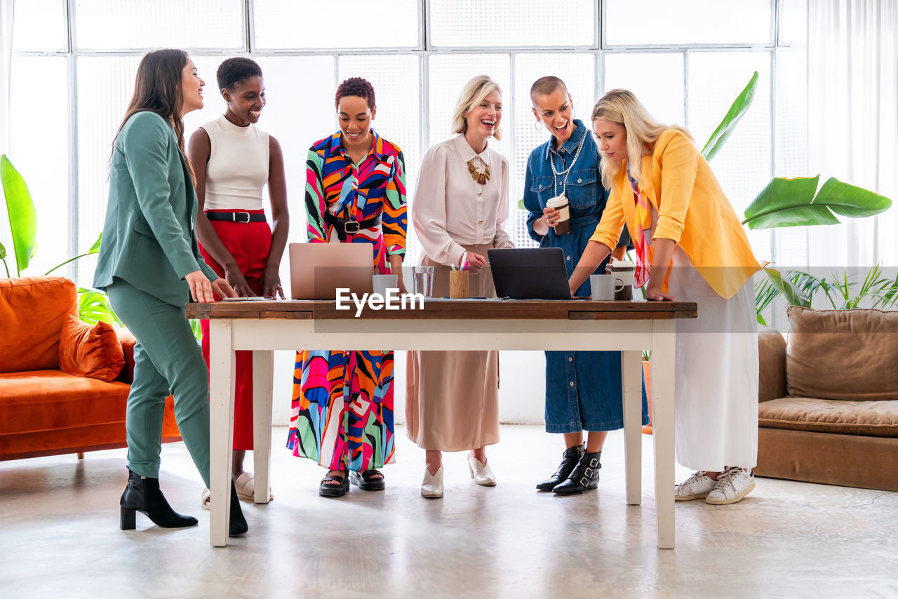 business colleagues working at desk in office