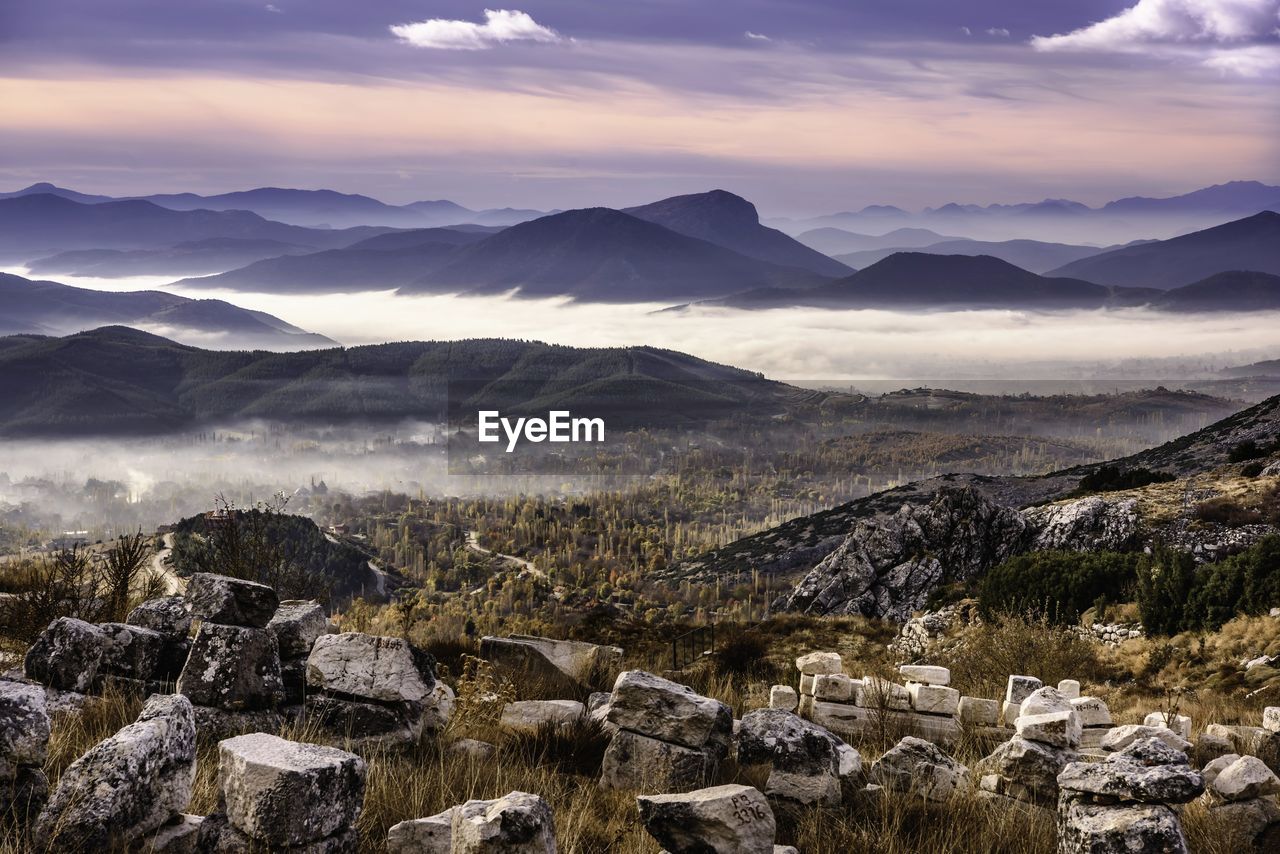 Scenic view of landscape against sky at night