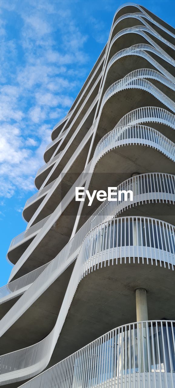 Low angle view of modern building against sky