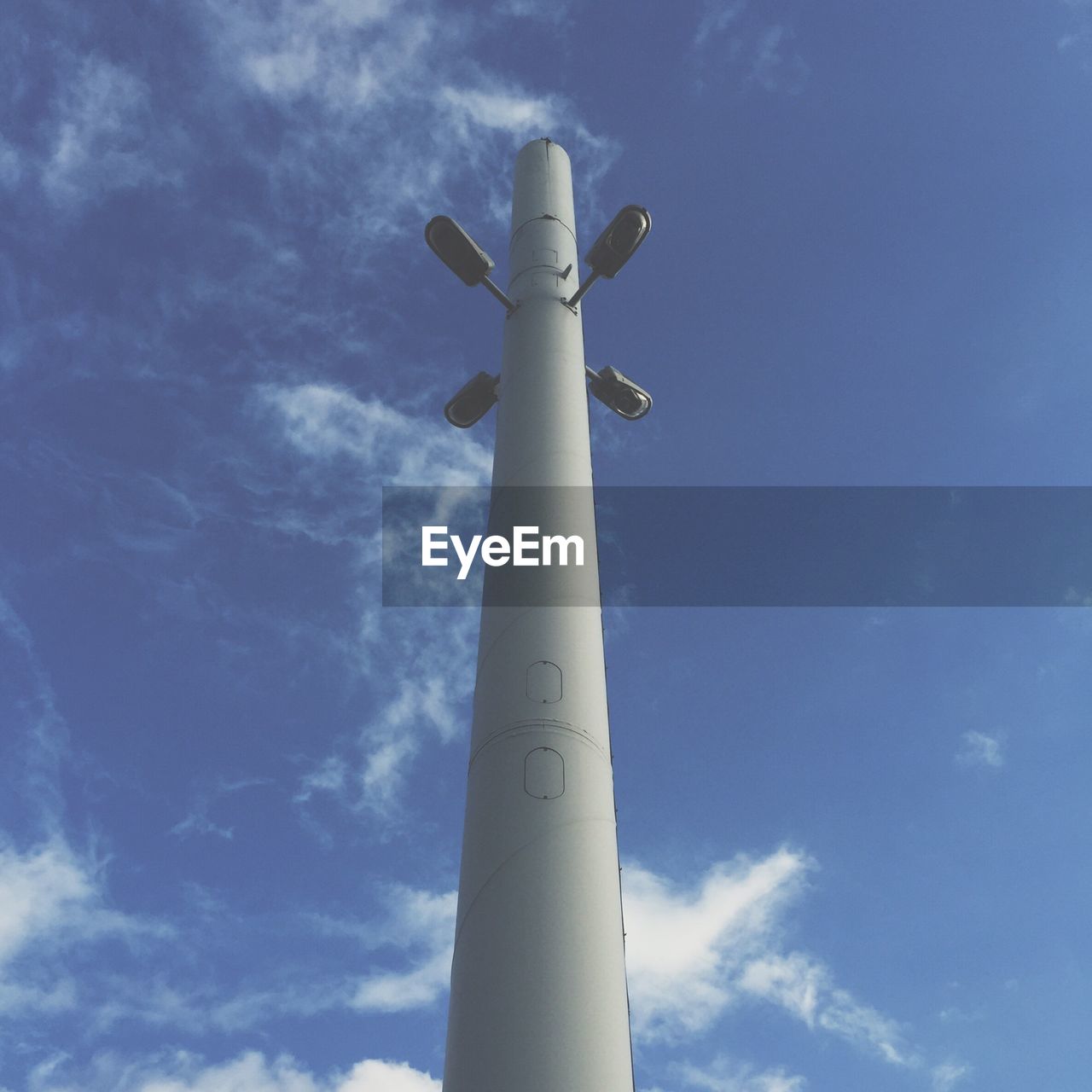 LOW ANGLE VIEW OF WIND TURBINE AGAINST SKY