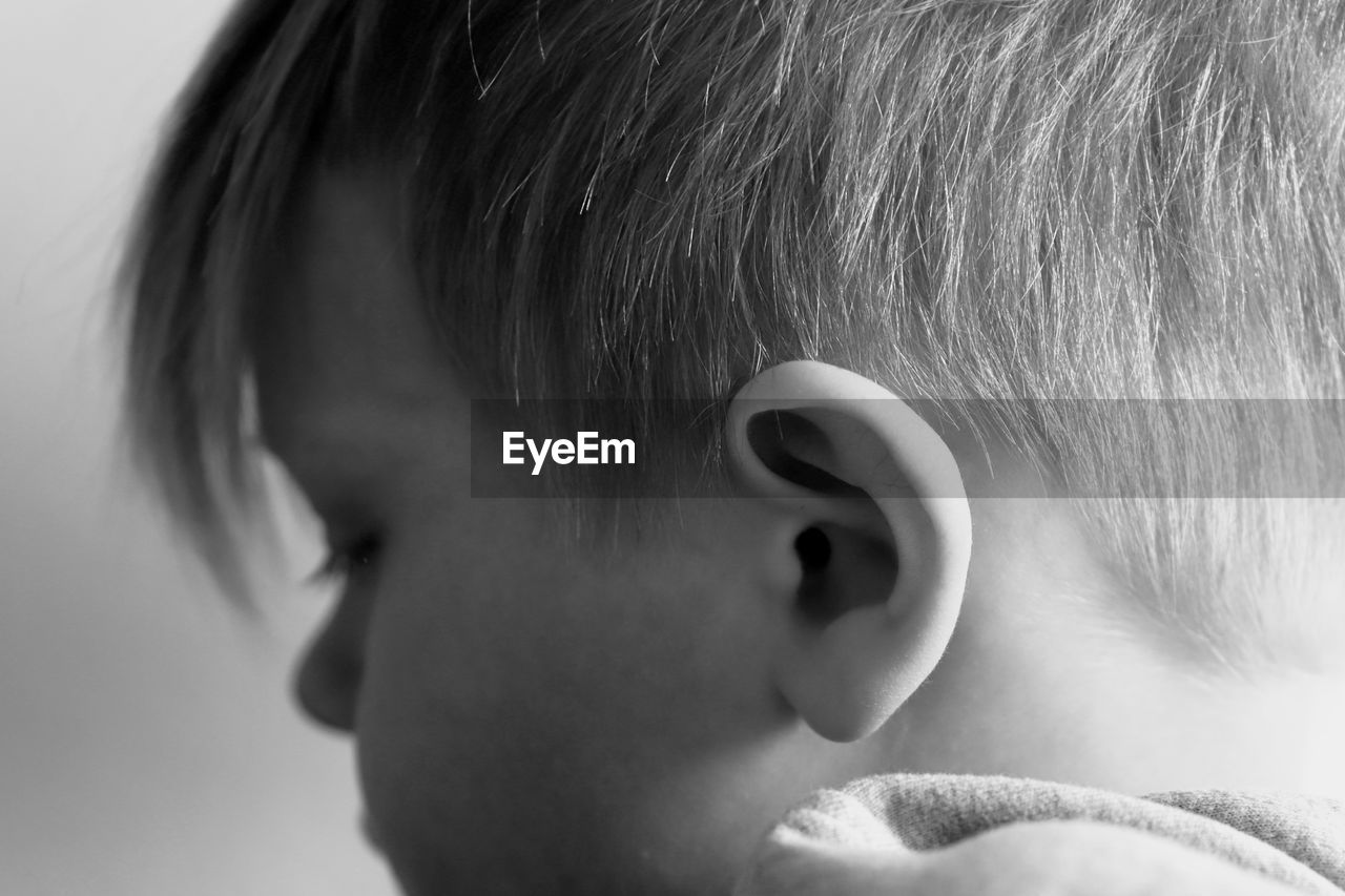 Close-up of boy looking away