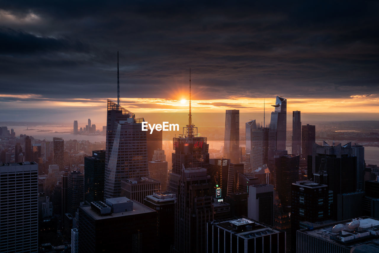 CITYSCAPE AGAINST SKY DURING SUNSET