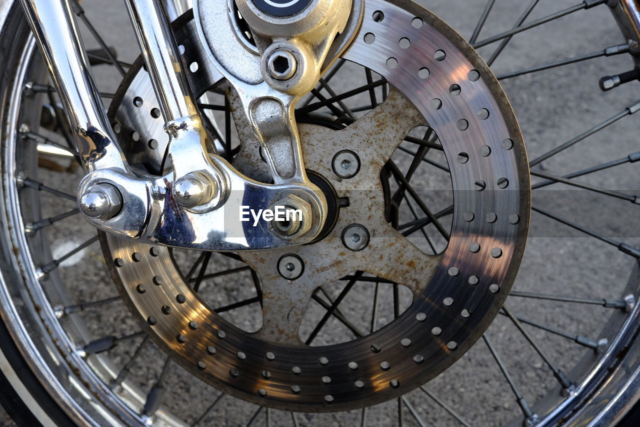 Extreme close-up of motorcycle wheel