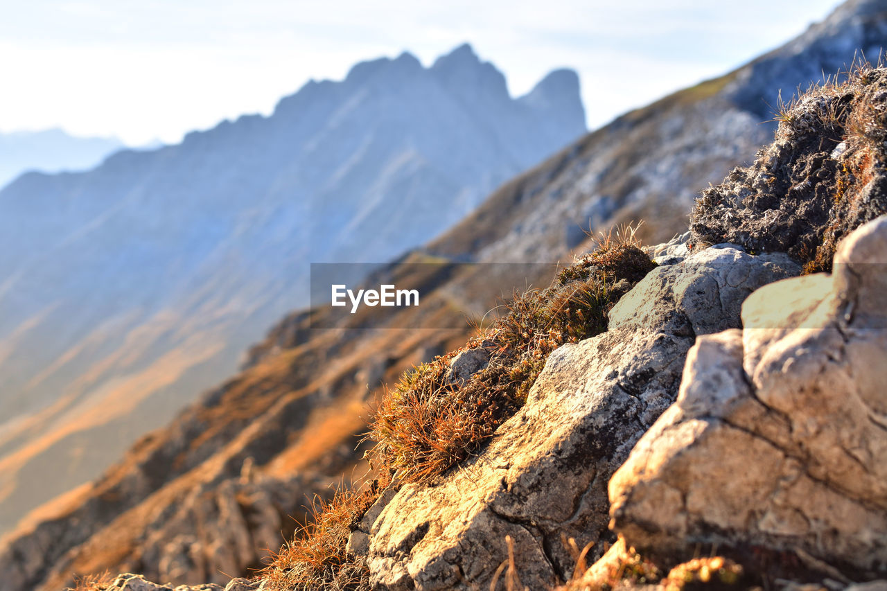 Rocks on mountain against sky