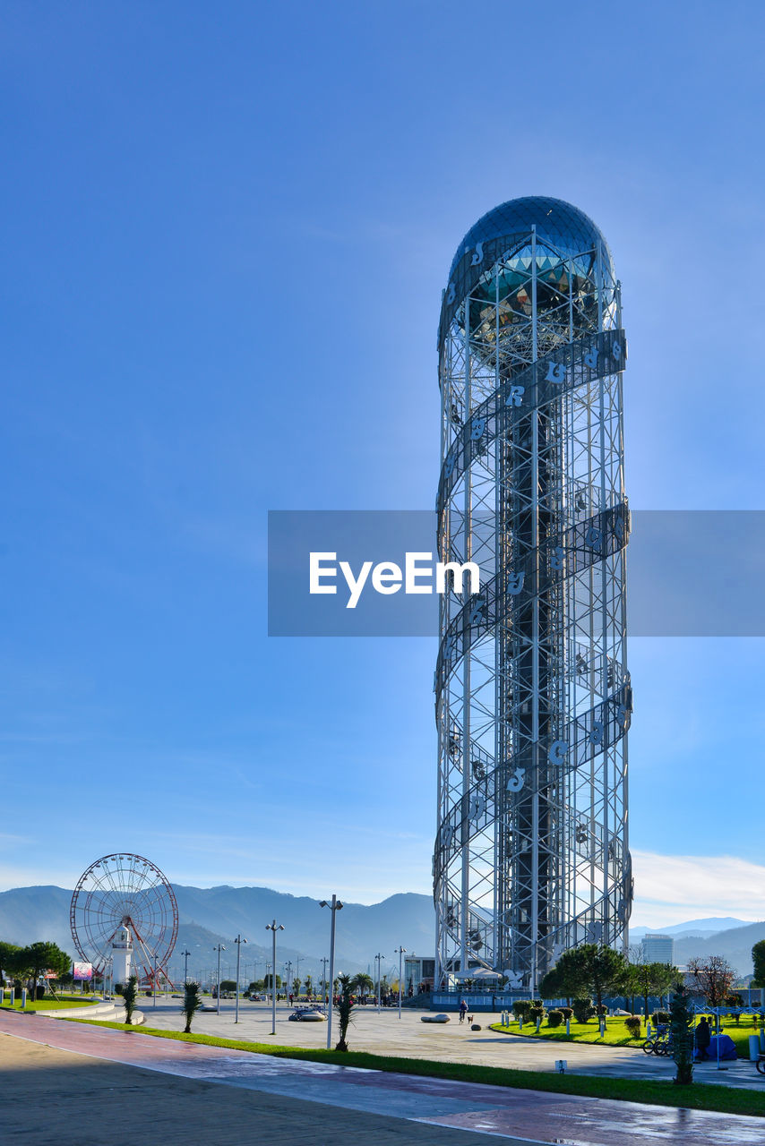 low angle view of modern building against clear blue sky