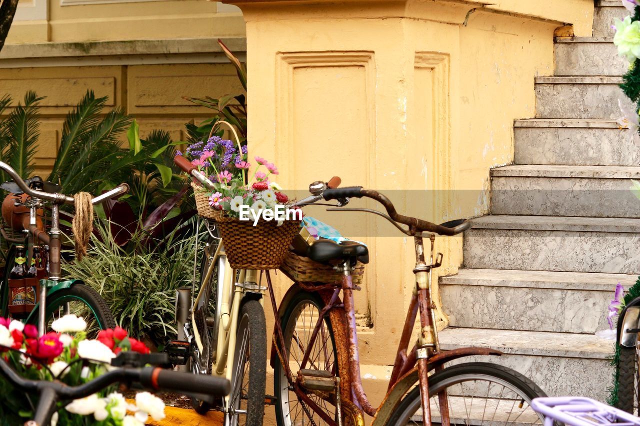 Bicycles in parking lot against building