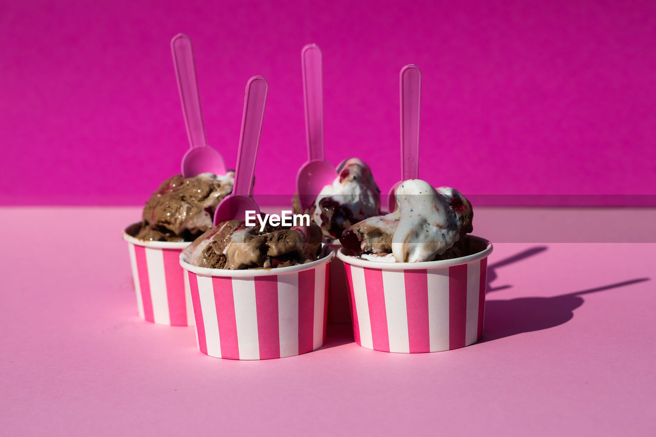 View of ice cream over pink background