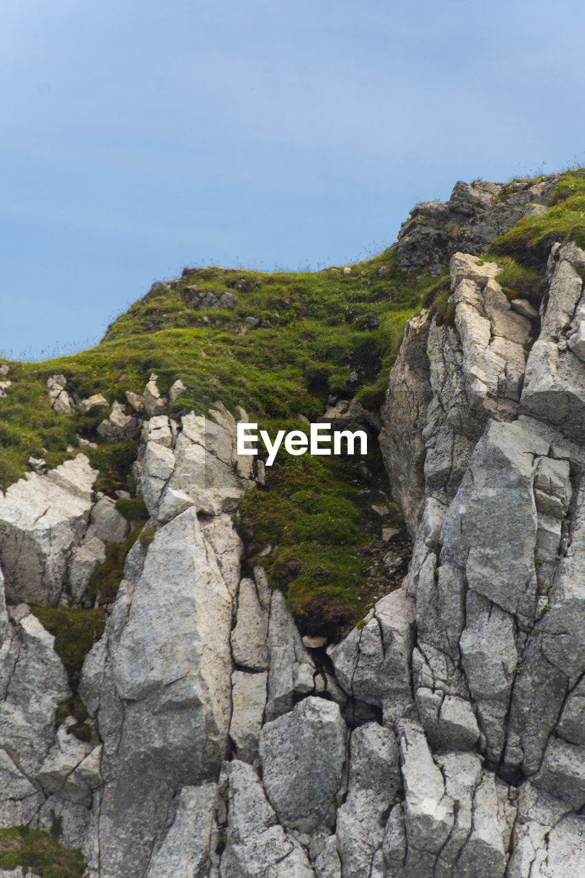 Scenic view of rocky mountains against clear sky