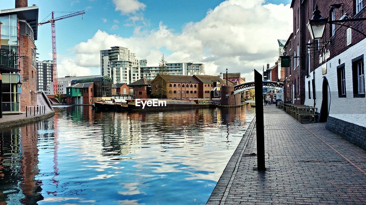 View of canal along buildings