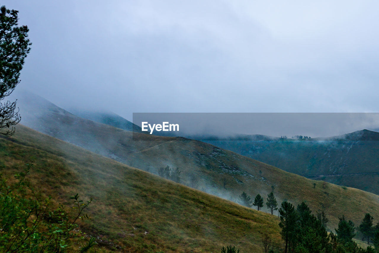 Scenic view of mountains against sky