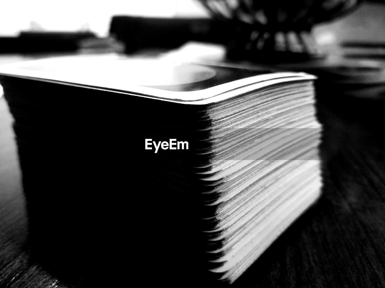 CLOSE-UP OF WOMAN READING BOOK BY BOOKS