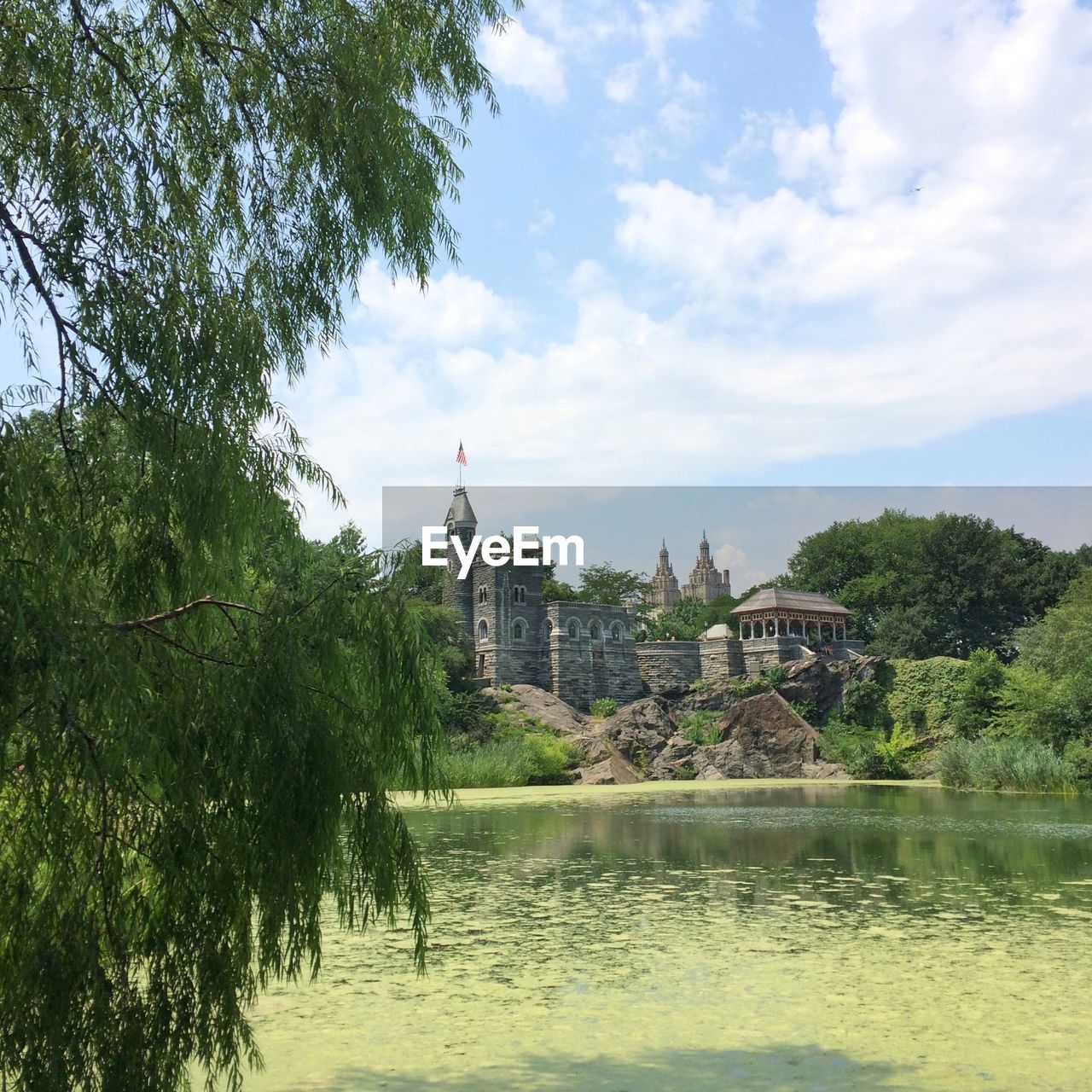 RIVER WITH BUILDINGS IN BACKGROUND