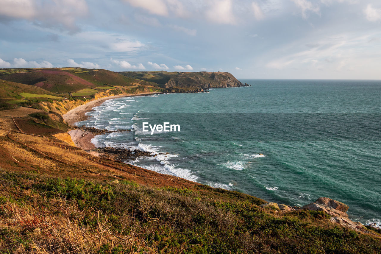 Scenic view in warm tones and colours ecalgrain bay in normandy, france.