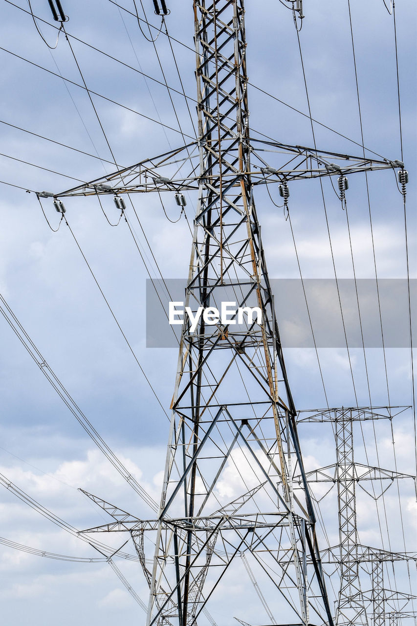 LOW ANGLE VIEW OF ELECTRICITY PYLON