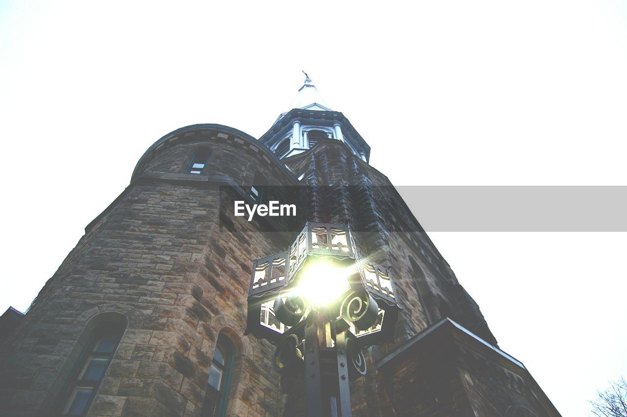 LOW ANGLE VIEW OF CLOCK TOWER IN CITY