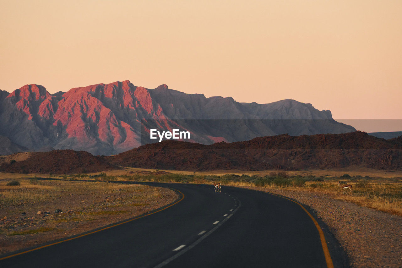 empty road against clear sky