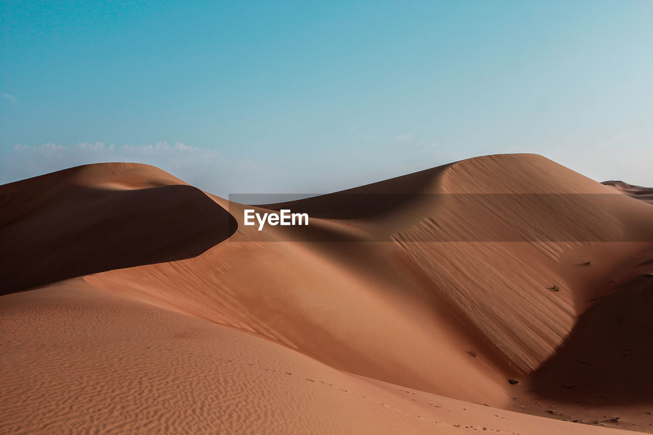 Scenic view of desert against sky