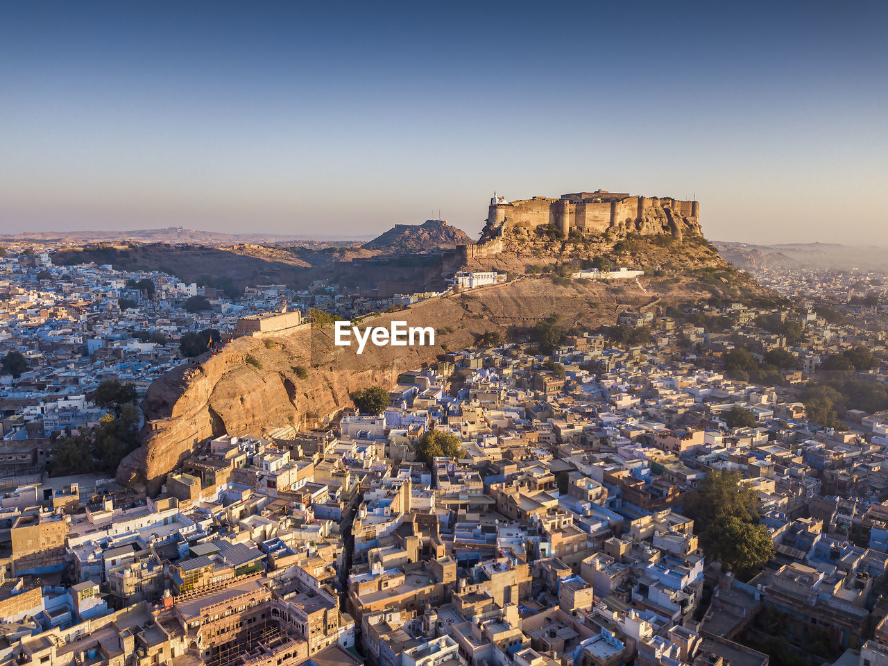 AERIAL VIEW OF TOWNSCAPE AGAINST CLEAR SKY