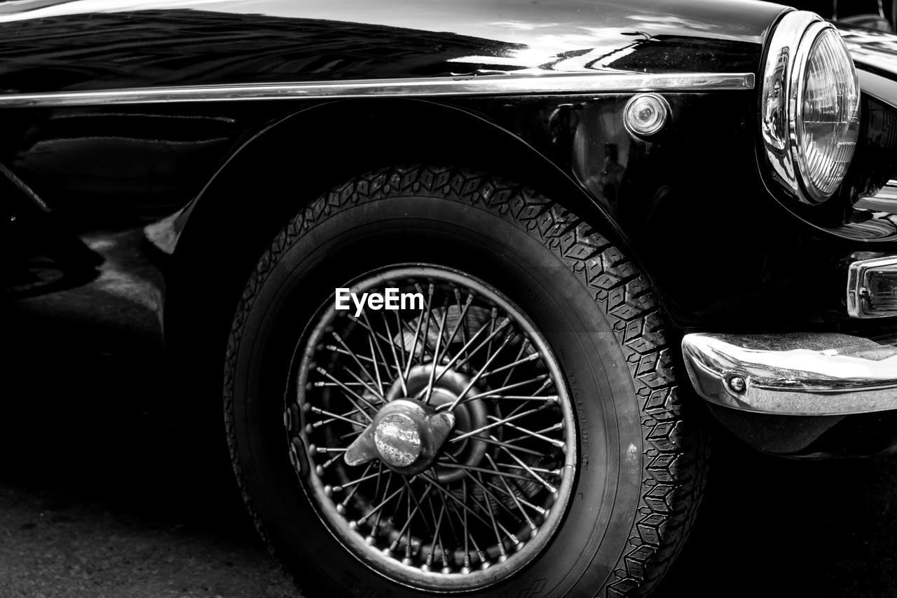 Cropped image of vintage car on street