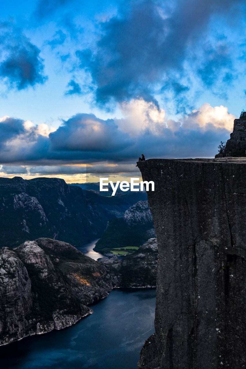 Scenic view of sea against cloudy sky