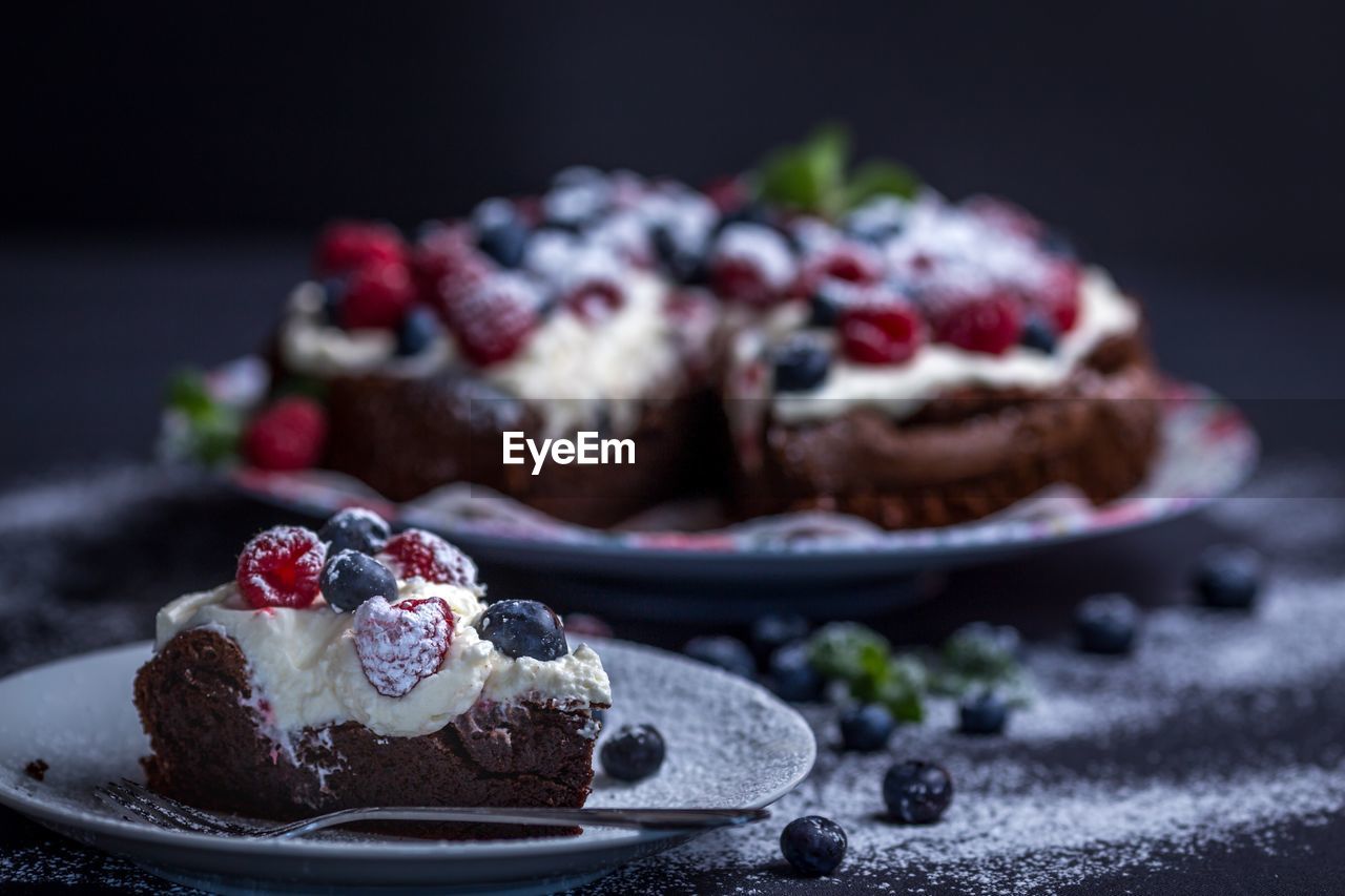 Close-up of cake in plates on table