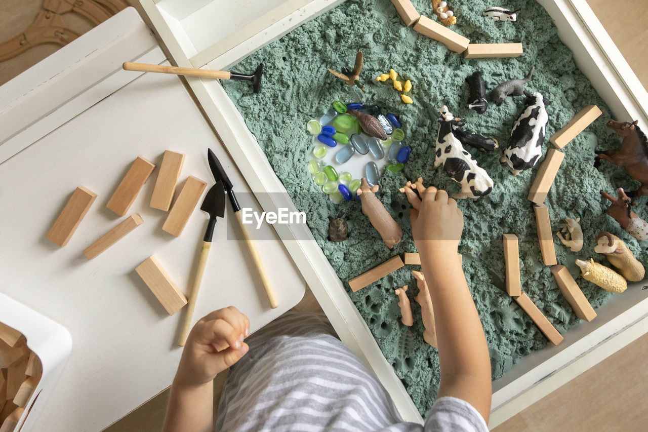 high angle view of people working on table