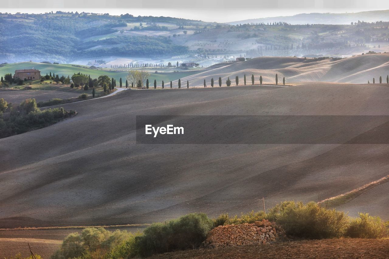 HIGH ANGLE VIEW OF ROAD AMIDST LANDSCAPE