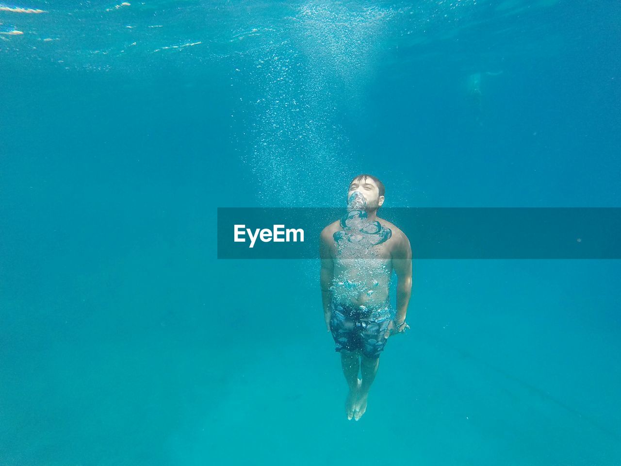 High angle view of person swimming in pool