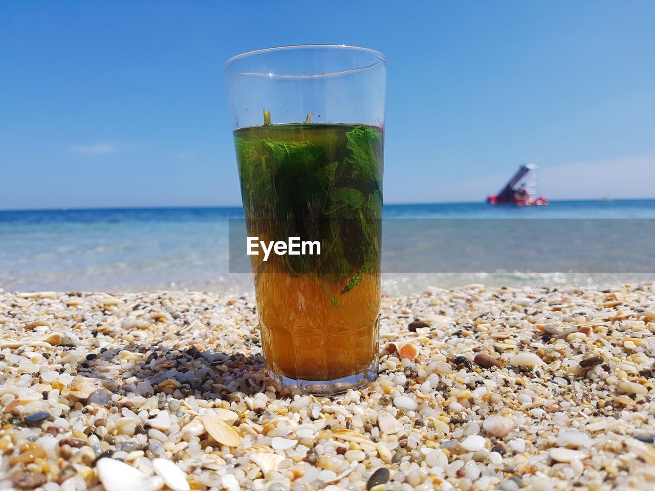 DRINK ON ROCK AT BEACH