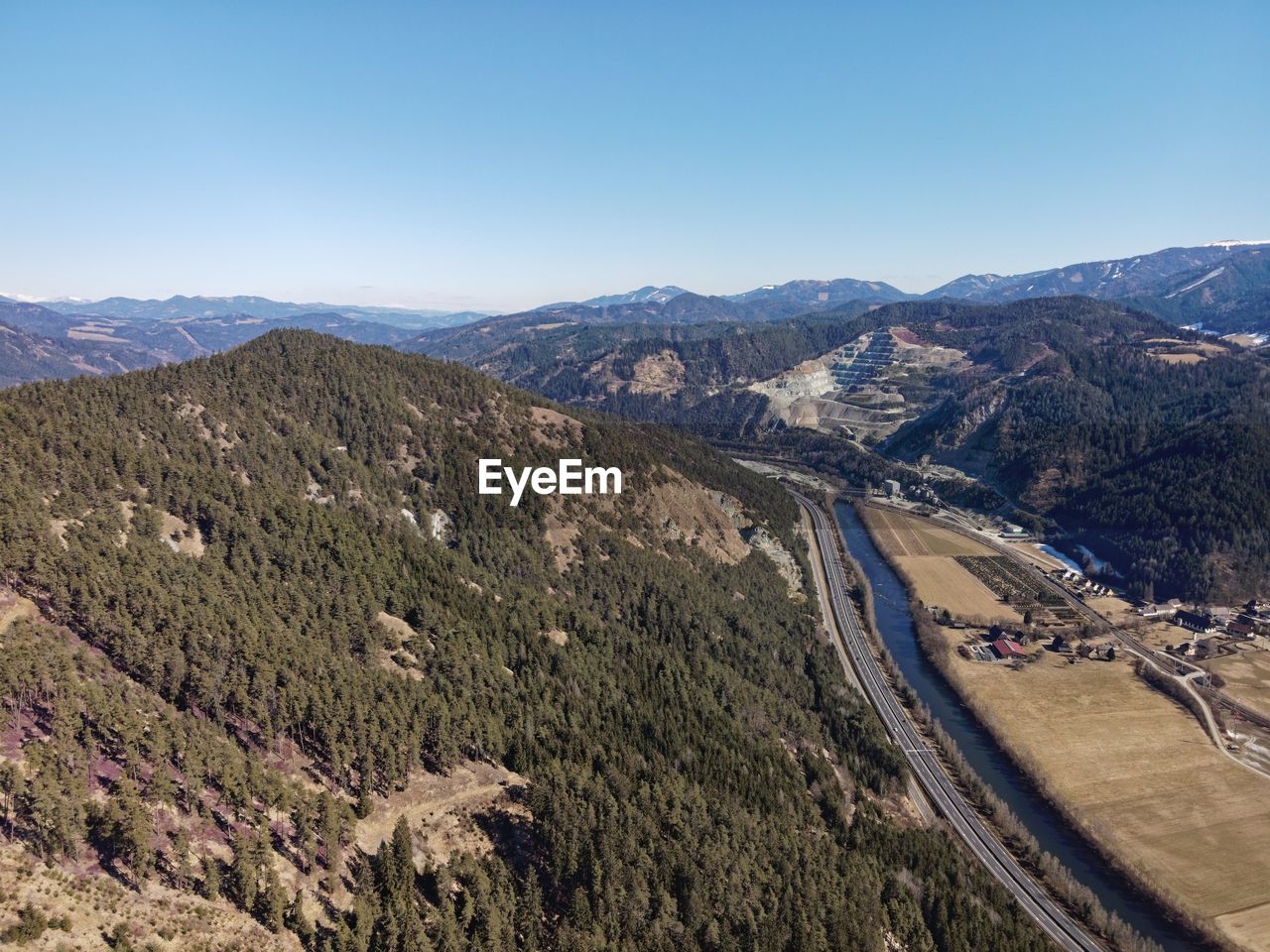 HIGH ANGLE VIEW OF MOUNTAINS AGAINST SKY