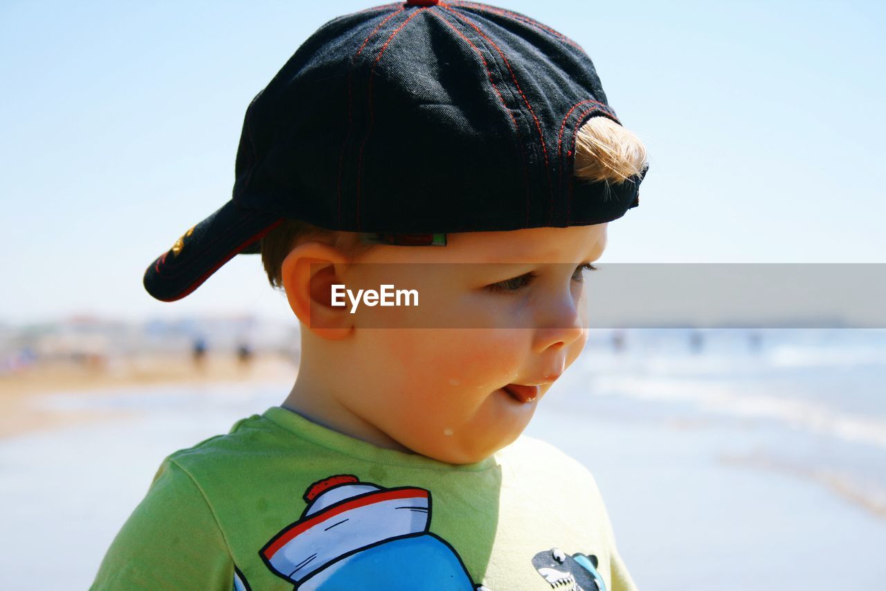Close-up portrait of boy looking away
