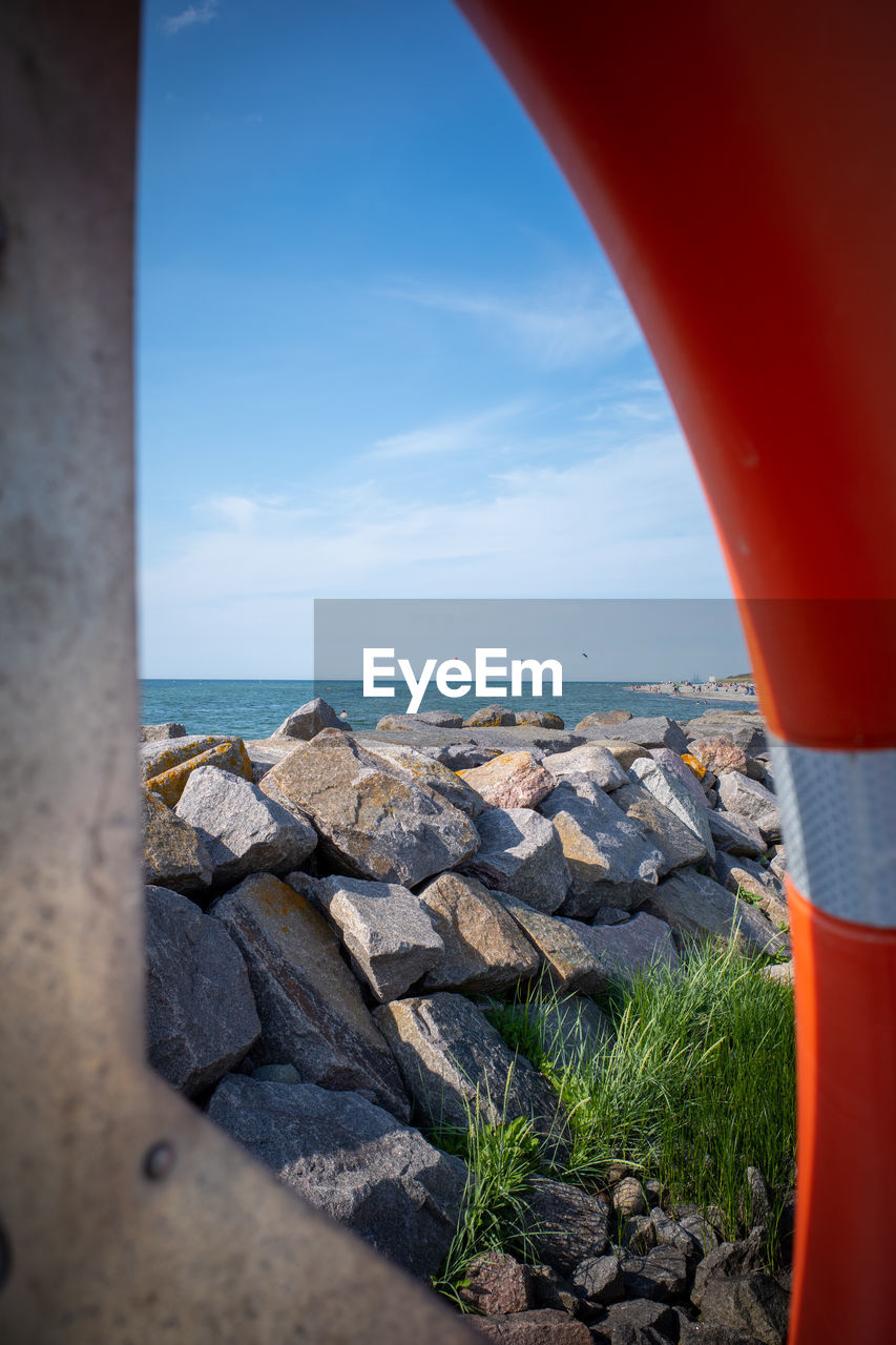 The beach of timmendorf on poel photographed through a life preserver