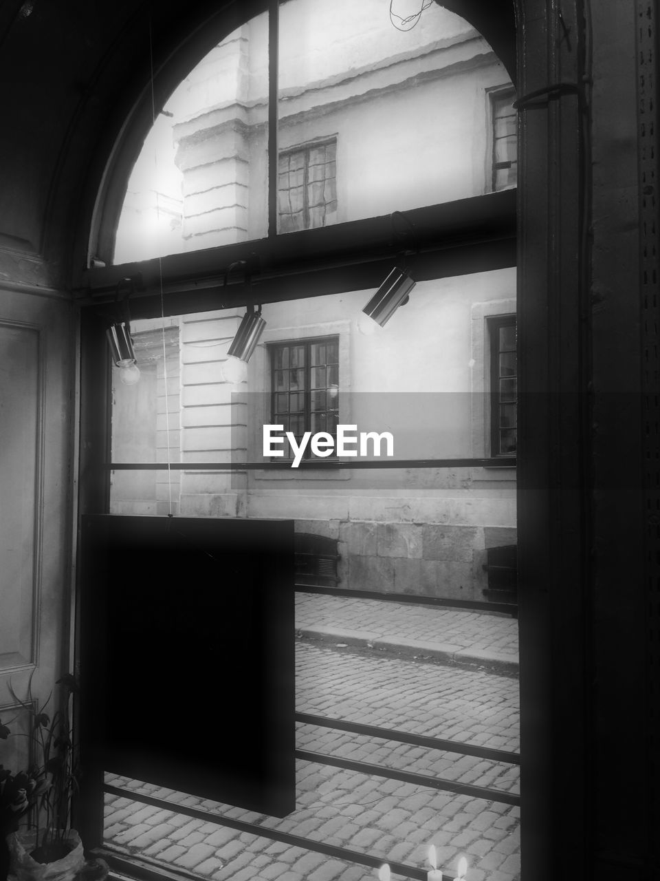 Building seen through arch door