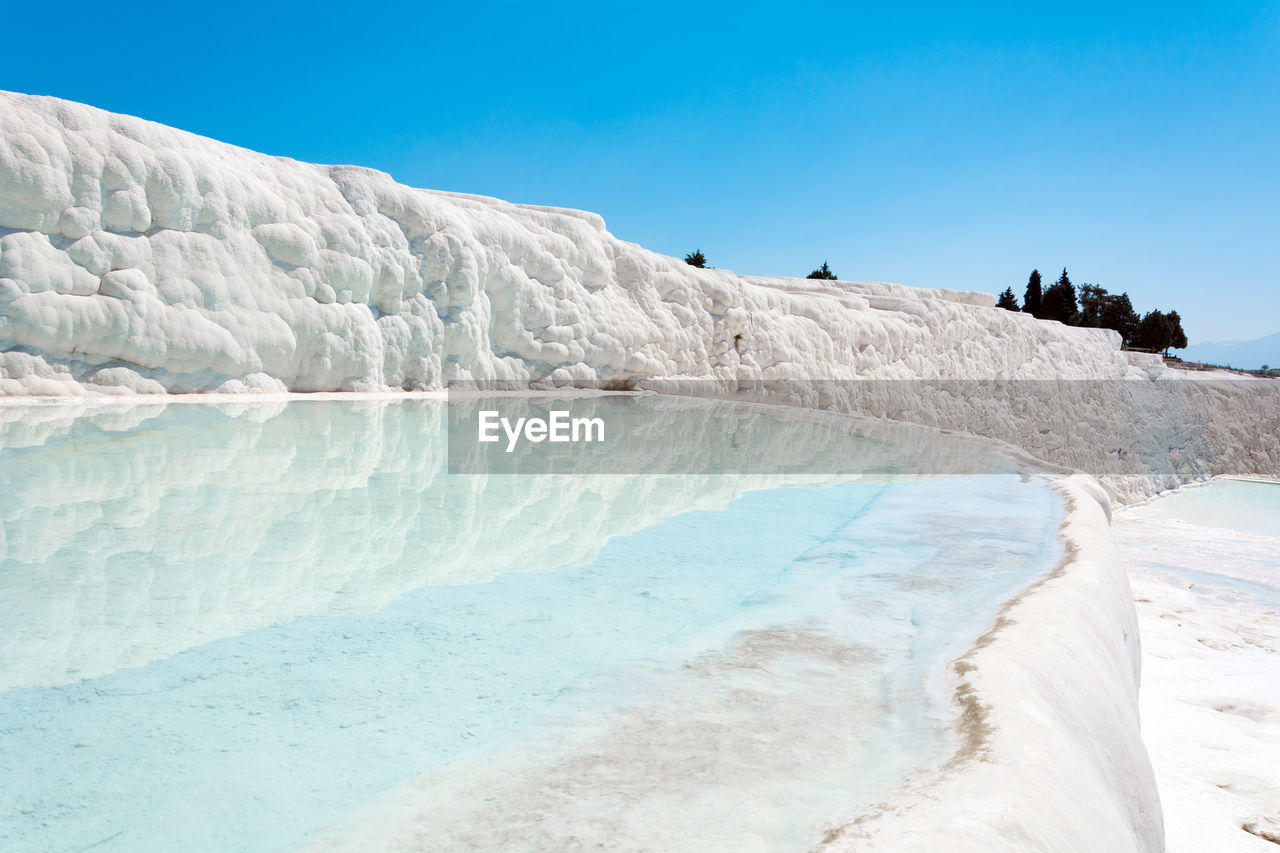 Natural travertine pools and terraces in pamukkale at turkey. 
