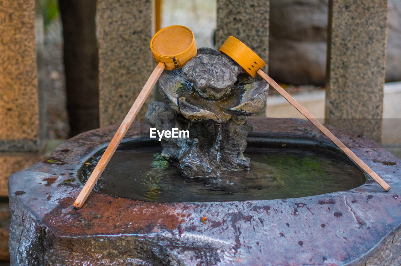 WATER FLOWING FROM FOUNTAIN