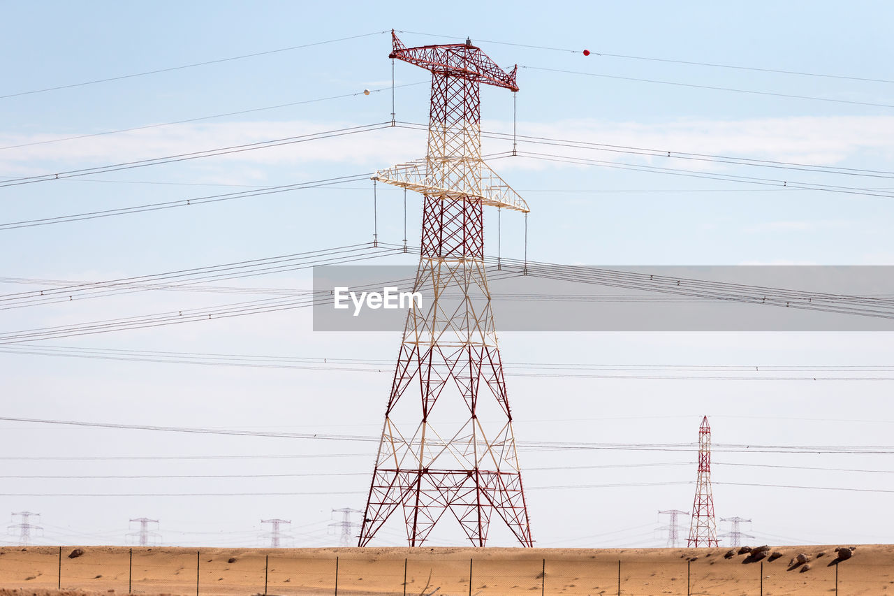 LOW ANGLE VIEW OF ELECTRICITY PYLON AGAINST SKY