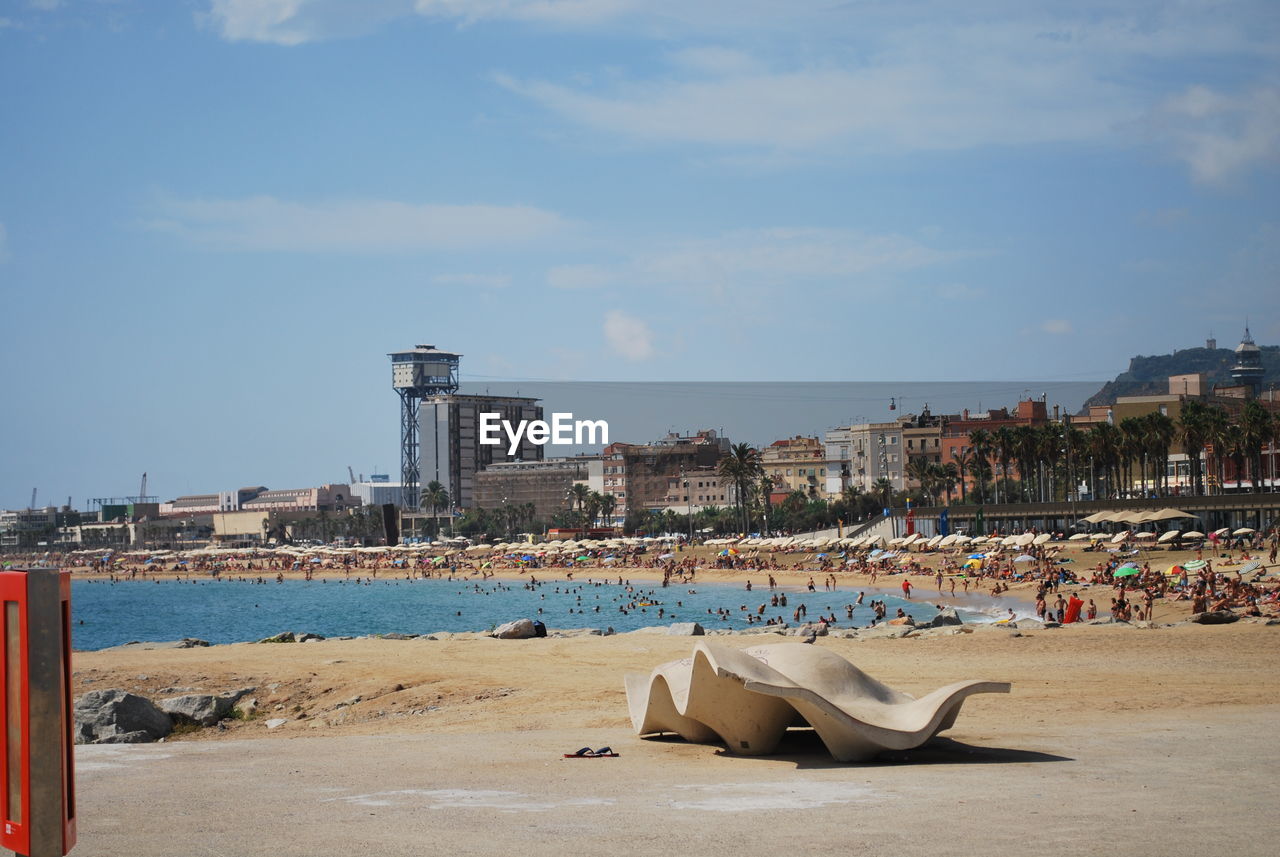 Panoramic view of beach against sky in city