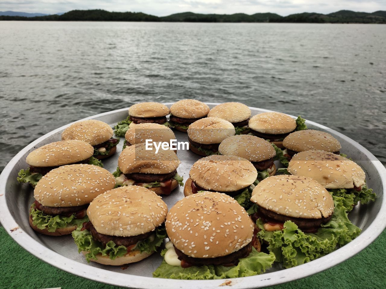 fast food, food, food and drink, baked, water, dish, freshness, no people, nature, hamburger, lake, healthy eating, meal, sandwich, sky, day