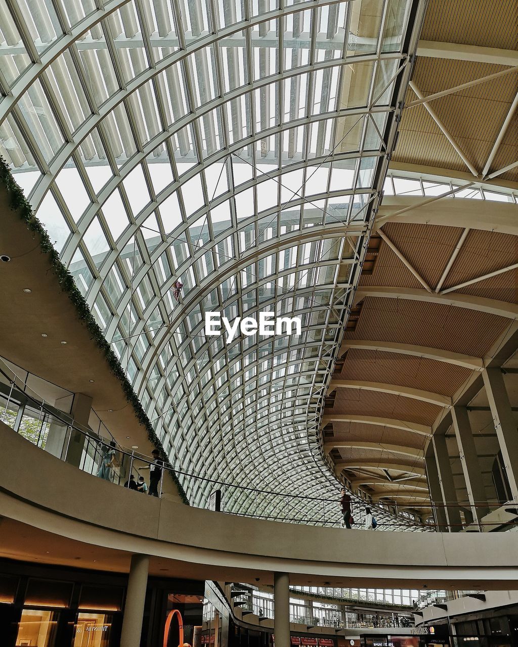 LOW ANGLE VIEW OF CEILING OF SHOPPING MALL IN A BUILDING