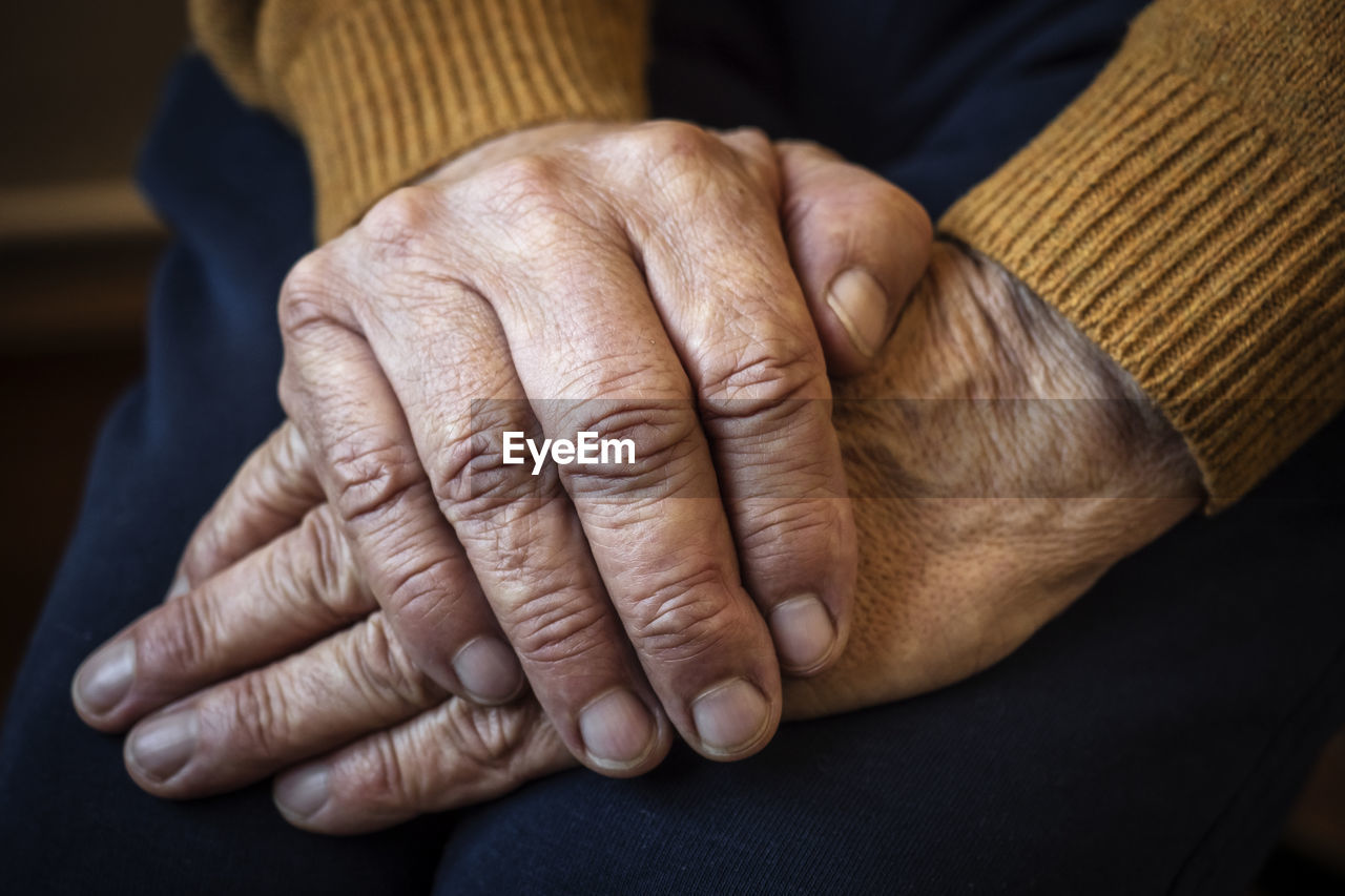 Wrinkled hands of an elderly man