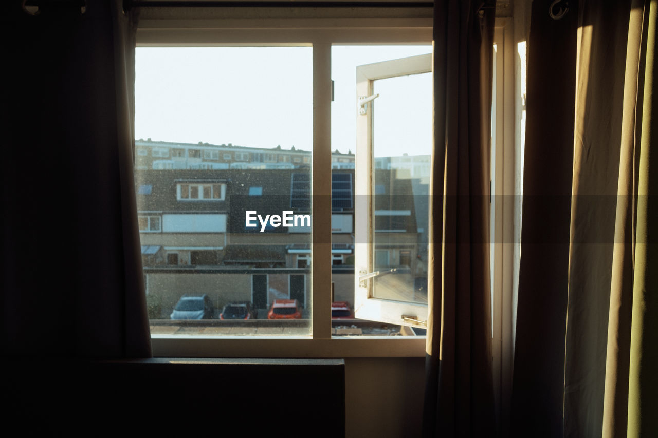 Buildings seen through window