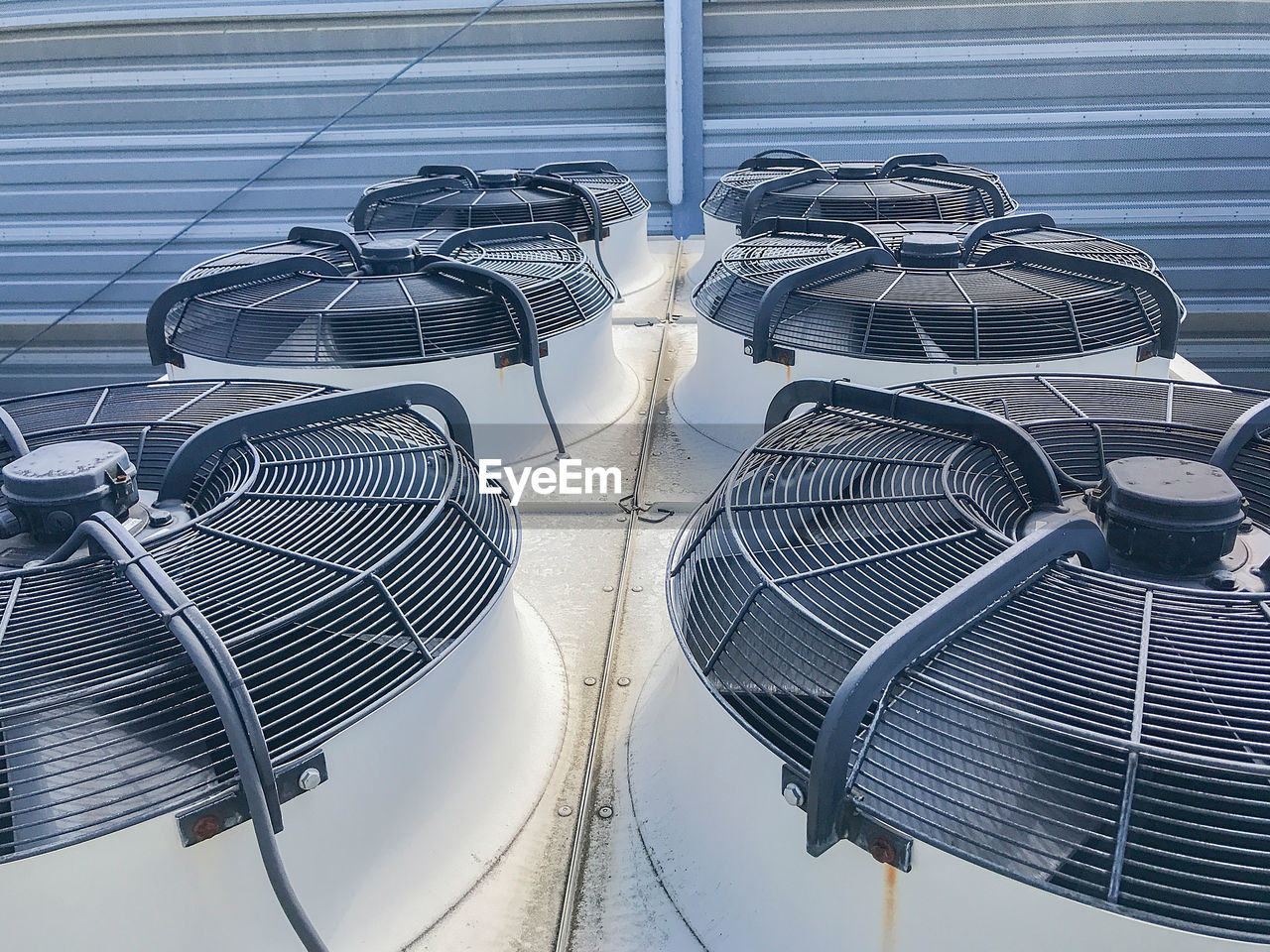 Low angle view of air conditioner fans