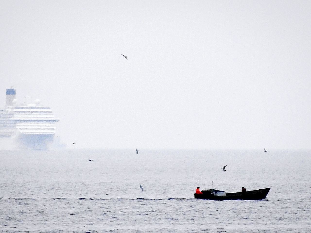 SCENIC VIEW OF BOAT IN SEA