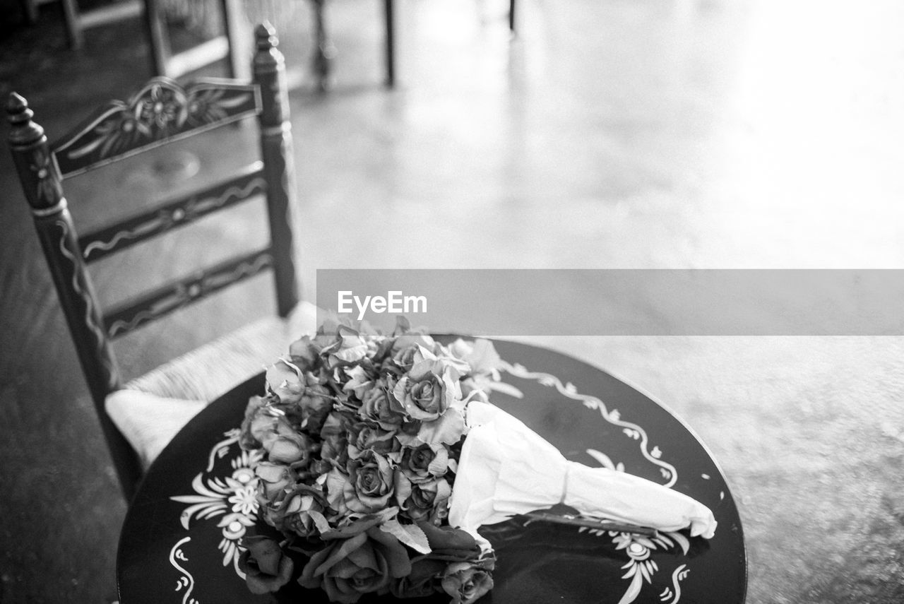 black, black and white, white, monochrome photography, monochrome, flower, nature, focus on foreground, flowering plant, plant, day, seat, one person, outdoors, ceremony, bride, adult, chair